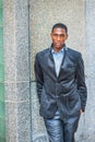 Young African American Man thinking outside on street in New York Royalty Free Stock Photo