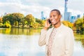 Young African American Man traveling in Central Park, New York Royalty Free Stock Photo
