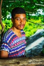 Young African American Man traveling, relaxing at Central Park, Royalty Free Stock Photo