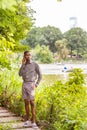 Young African American Man waiting for you at Central Park in New York Royalty Free Stock Photo