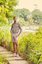 Young African American Man waiting for you at Central Park in New York Royalty Free Stock Photo