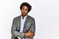 Young african american man wearing business jacket over isolated white background skeptic and nervous, disapproving expression on Royalty Free Stock Photo