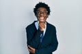 Young african american man wearing business suit and tie angry and mad screaming frustrated and furious, shouting with anger Royalty Free Stock Photo