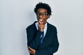 Young african american man wearing business suit and tie angry and mad screaming frustrated and furious, shouting with anger Royalty Free Stock Photo