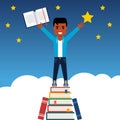 Young African American on pile of books reaching out for the star. Achieving goals through education.