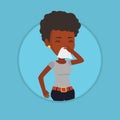 Young african-american sick woman sneezing. Royalty Free Stock Photo