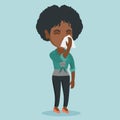 Young african-american sick woman sneezing. Royalty Free Stock Photo