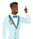 Young african-american smiling groom with pen.