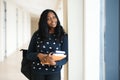 Young african american student girl smiling happy walking at university campus Royalty Free Stock Photo