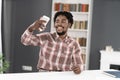 Young African American student use smartphone having video call or taking selfie. Portrait of happy man gesturing Royalty Free Stock Photo