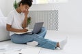 Young african american student watching boring online lecture Royalty Free Stock Photo