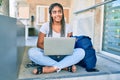 Young african american student woman smiling happy using computer laptop at the university campus Royalty Free Stock Photo