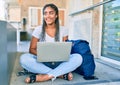 Young african american student woman smiling happy using computer laptop at the university campus Royalty Free Stock Photo