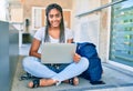 Young african american student woman smiling happy using computer laptop at the university campus Royalty Free Stock Photo