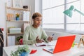 Young african american teen boy student having a video call using laptop at home Royalty Free Stock Photo