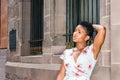 Young African American Woman with afro hair, relaxing, thinking outside in New York City Royalty Free Stock Photo