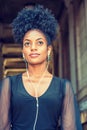 Young African American woman with afro hairstyle traveling in New York City Royalty Free Stock Photo