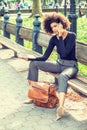 Young African American Woman with afro hairstyle traveling, working in New York City Royalty Free Stock Photo