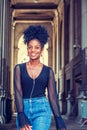 Young African American woman with afro hairstyle traveling in New York City Royalty Free Stock Photo