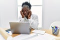 Young african american woman architect stressed working at architecture studio Royalty Free Stock Photo