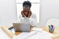 Young african american woman architect stressed working at architecture studio Royalty Free Stock Photo