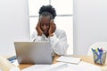 Young african american woman architect stressed working at architecture studio Royalty Free Stock Photo