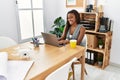 Young african american woman architect using laptop working at office Royalty Free Stock Photo