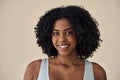 Young African American woman beauty female model at beige background. Portrait. Royalty Free Stock Photo