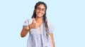 Young african american woman with braids wearing casual summer clothes and glasses doing happy thumbs up gesture with hand Royalty Free Stock Photo