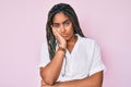 Young african american woman with braids wearing casual summer shirt thinking looking tired and bored with depression problems Royalty Free Stock Photo