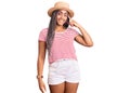 Young african american woman with braids wearing summer hat smiling pointing to head with one finger, great idea or thought, good Royalty Free Stock Photo