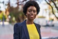 Young african american woman business executive smiling confident at park Royalty Free Stock Photo