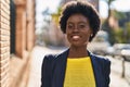 Young african american woman business executive smiling confident at street Royalty Free Stock Photo