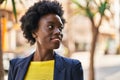 Young african american woman business executive smiling confident at street Royalty Free Stock Photo