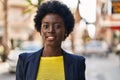 Young african american woman business executive smiling confident at street Royalty Free Stock Photo