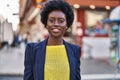 Young african american woman business executive smiling confident at street Royalty Free Stock Photo