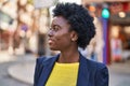 Young african american woman business executive smiling confident at street Royalty Free Stock Photo