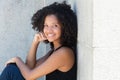 Young african american woman with curly black hair