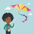 Young african-american woman flying kite.