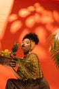 young african american woman holding basket Royalty Free Stock Photo