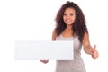 Young African American woman holding blank sign isolated on a white background Royalty Free Stock Photo