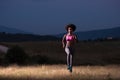 Young African american woman jogging in nature