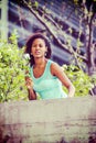 Young African American woman missing you with white rose in New Royalty Free Stock Photo