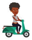 Young african-american woman riding scooter.