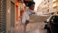 Young african american woman with serious expression holding city map at street Royalty Free Stock Photo