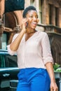 Young African American Woman with short afro hair traveling in N Royalty Free Stock Photo