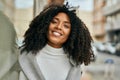 Young african american woman smiling happy standing at the city Royalty Free Stock Photo