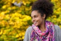 Young african american woman smiling outdoors in autumn Royalty Free Stock Photo