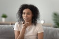 Young african American woman talk on cell using speakerphone Royalty Free Stock Photo