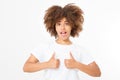 Young african american woman in template blank t shirt showing big thumb up isolated on white background. Afro curly hair.